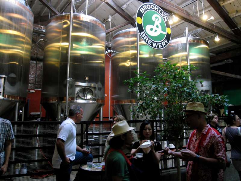 This June 25, 2011 photo shows visitors sampling beer at the Brooklyn Brewery in the Brooklyn borough of New York. The brewery is located in a 150-year-old factory in Williamsburg, a working-class section of Brooklyn with a gritty industrial past that has become popular among hipsters and is starting to attract tourists. The brewery also offers weekend tours that attract visitors from around the world.