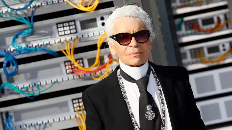 Fashion designer Karl Lagerfeld appears at the end of the presentation of Chanel's Spring-Summer 2017 ready-to-wear fashion collection presented Tuesday, Oct.4, 2016 in Paris.