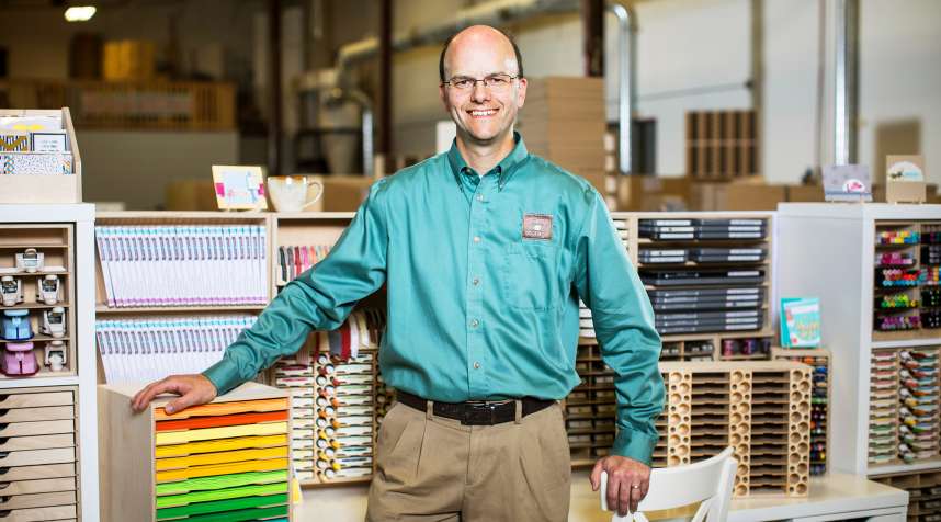 Brett Haugen stands with his craft storage products at Stamp-n-Storage in Hutchinson, Minn., on Sunday, Sept. 18, 2016. 
                      
                      Photo by Ackerman + Gruber
                      @ackermangruber