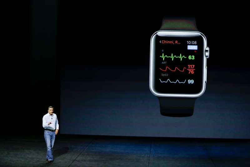 Dr. Cameron Powell with Airstrip, talks about health monitor options on the Apple Watch during the Apple event at the Bill Graham Civic Auditorium in San Francisco, Wednesday, Sept. 9, 2015. (AP Photo/Eric Risberg)