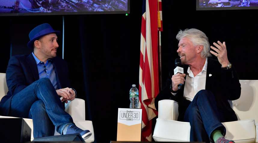 Sir Richard Branson answers audience questions and speaks with Forbes Magazine Editor Randall Lane at the 2016 Forbes Under 30 Summit at Faneuil Hall on Monday, October 17, 2016 in Boston, Massachusetts.