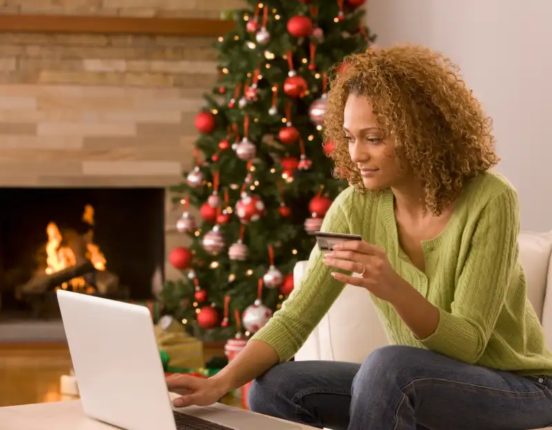 Mixed race woman shopping online