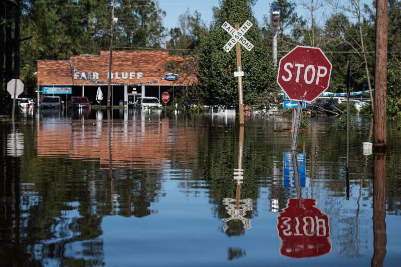 A roadway is flooded by remnants of Hurricane Matthew in Fair Bluff, N.C., on Oct. 11, 2016.