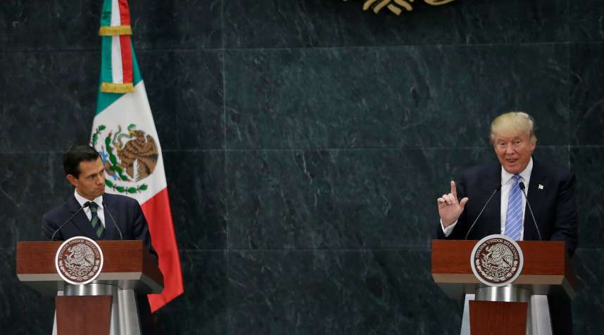 U.S. Republican presidential nominee Donald Trump and Mexico's President Enrique Pena Nieto give a press conference in Mexico City in August.