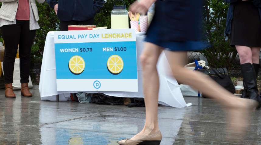 Democratic National Committee (DNC) women host an Equal Pay Day event with a lemonade stand   where women pay 79 cents per cup and men pay $1 per cup, to highlight the wage gap  on April 12, 2016 in Washington, DC.