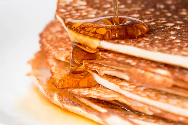 Stack of pancakes with maple syrup