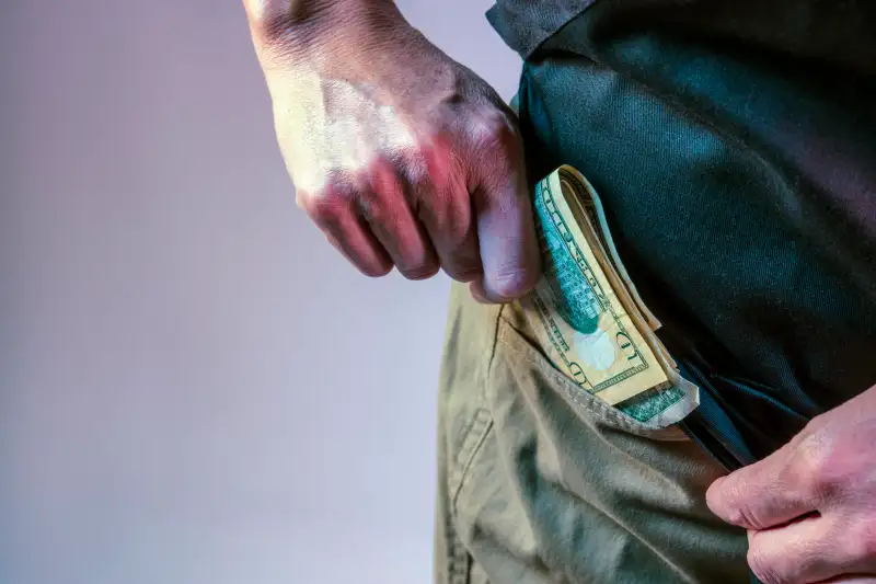 Employee cash theft concept