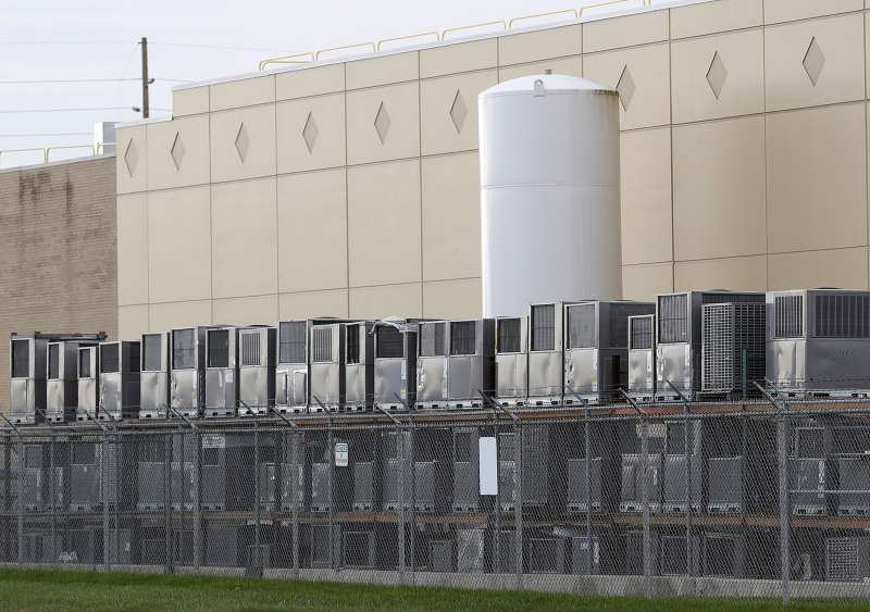 Air conditioning units are stacked outside the Carrier Corp. plant, Wednesday, Nov. 30, 2016, in Indianapolis.