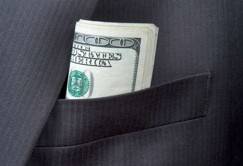 Money in a suit jacket