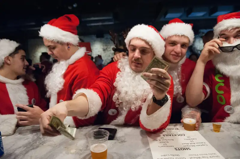 Annual SantaCon Pub Crawl Held In New York City