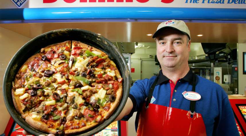 Domino's will give company stock to some customers.