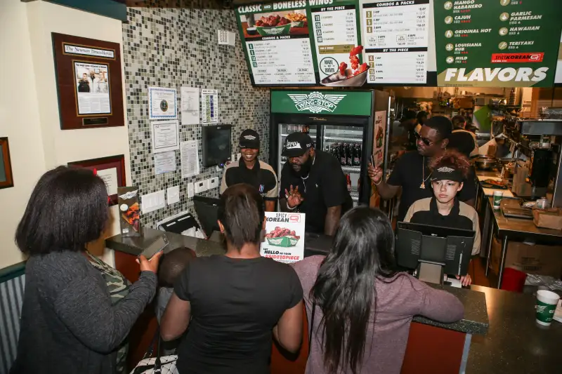 Rick Ross Visits Wingstop