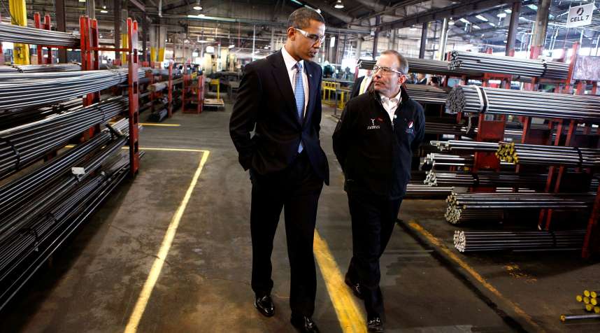 Barack Obama tours Cardinal Fasteners Specialty Company with the company president John Grabner January 16, 2009 in Bedford Heights, Ohio.