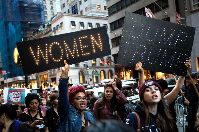 women protesting against Trump in New York