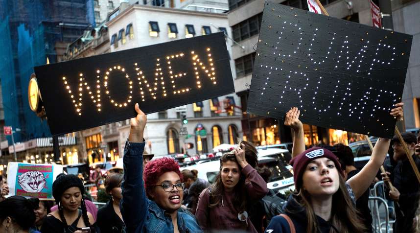 A group of protestors, comprised mostly of women, rally against Republican presidential candidate Donald Trump outside of Trump Tower, November 3, 2016 in New York City.