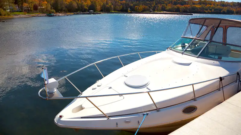 yacht on lake in fall