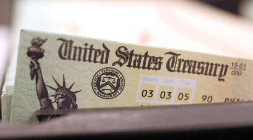 Blank Social Security checks are run through a printer at the U.S. Treasury printing facility February 11, 2005 in Philadelphia, Pennsylvania.