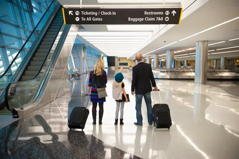 family at the airport between flights