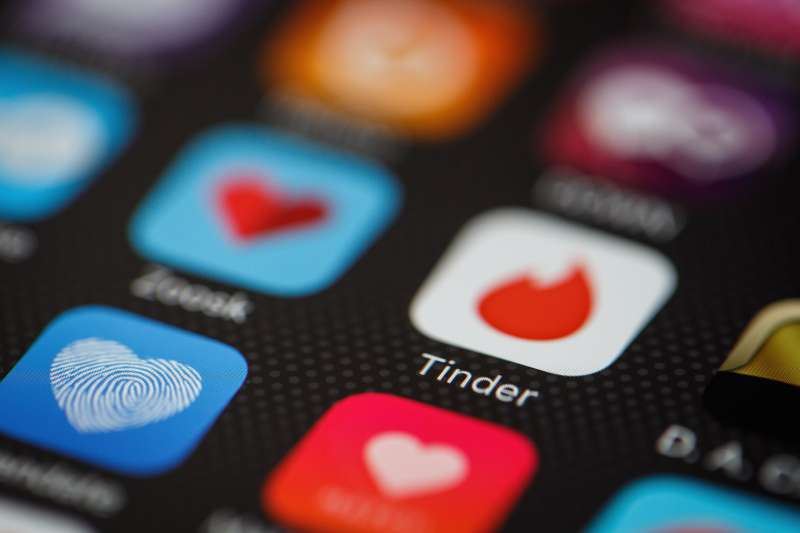 The  Tinder  app logo is seen amongst other dating apps on a mobile phone screen on Nov. 24, 2016.