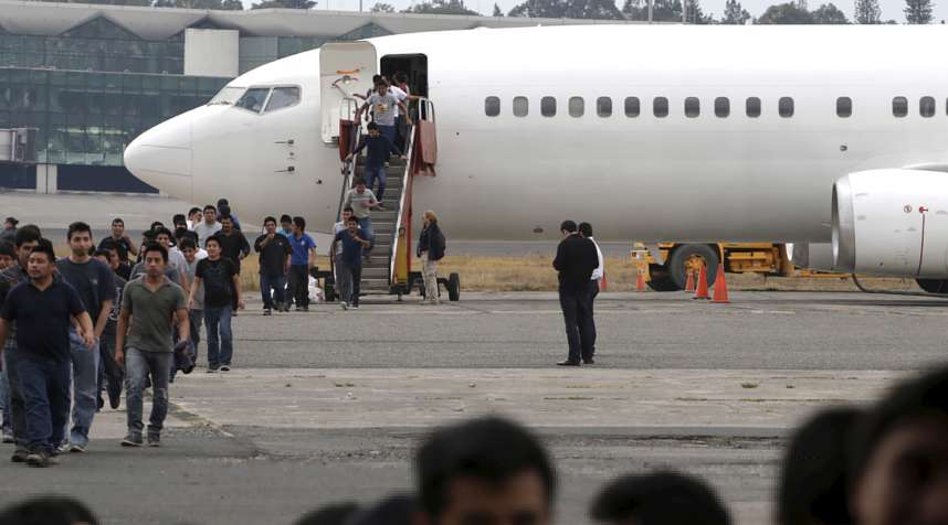 Illegal migrants from Guatemala, deported from the U.S., arrive at an air force base in Guatemala City, March 19, 2015.