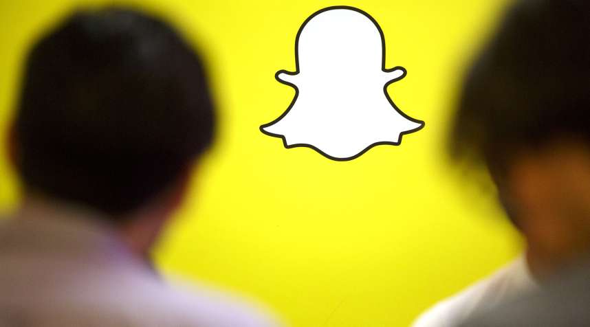 The Snapchat logo is displayed during the TechFair LA job fair in Los Angeles, California, U.S., on Thursday, Jan. 26, 2017.
