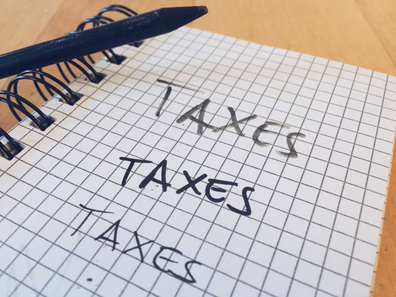 Taxes Written On Diary