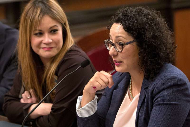 Assemblywoman Cristina Garcia, D-Bell Gardens, right, urges lawmakers to approve her measure to exempt tampons and other feminine hygiene products from sales tax as co-author Assemblywoman Ling Ling Chang, R-Diamond Bar, looks on, Wednesday, June 22, 2016, in Sacramento, Calif. The bill, AB1561, was approved by the Senate Governance and Finance committee. (AP Photo/Rich Pedroncelli)