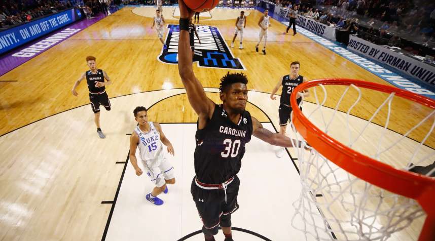 Chris Silva #30 of the South Carolina Gamecocks dunks the ball in the second half against the Duke Blue Devils during the second round of the 2017 NCAA Men's Basketball Tournament at Bon Secours Wellness Arena on March 19, 2017 in Greenville, South Carolina.