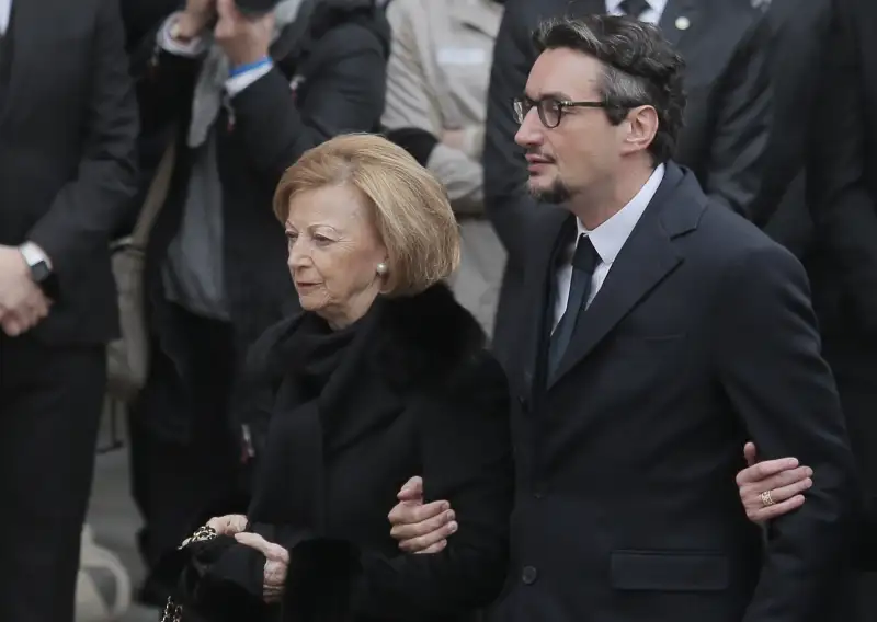 Maria Franca Ferrero, the widow of Michele Ferrero and his son Giovanni Ferrero arrive for the funeral of Michele Ferrero on Feb. 18, 2015 in Alba, northern Italy.