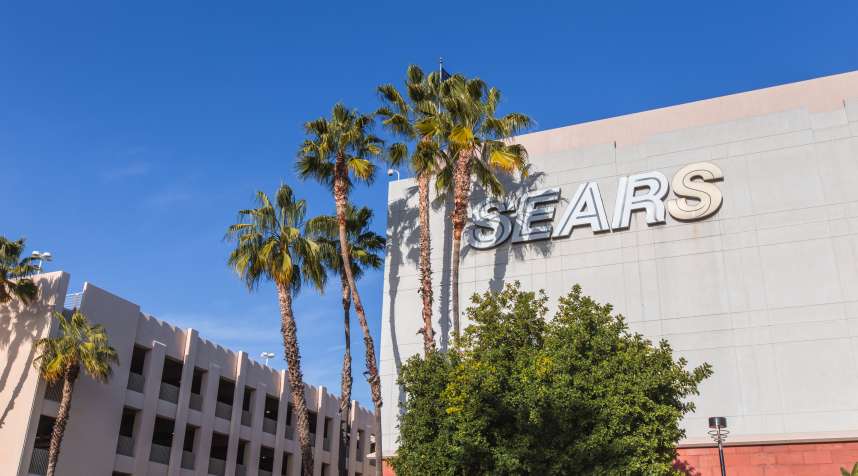 The main entrance of a closing Sears department in California.