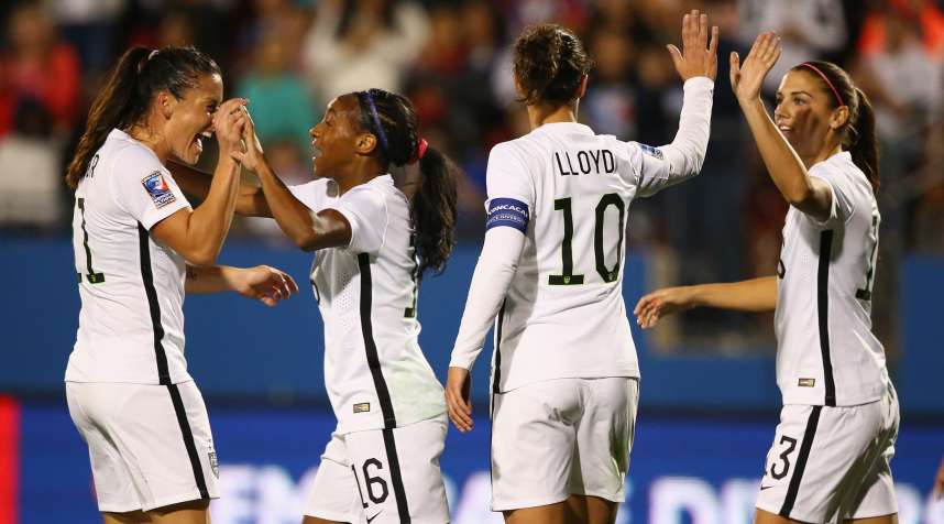 Crystal Dunn #16 of USA celebrates her goal with Ali Krieger #11, Carli Lloyd #10 and Alex Morgan #13 against Costa Rica during 2016 CONCACAF Women's Olympic Qualifying at Toyota Stadium on February 10, 2016 in Frisco, Texas.