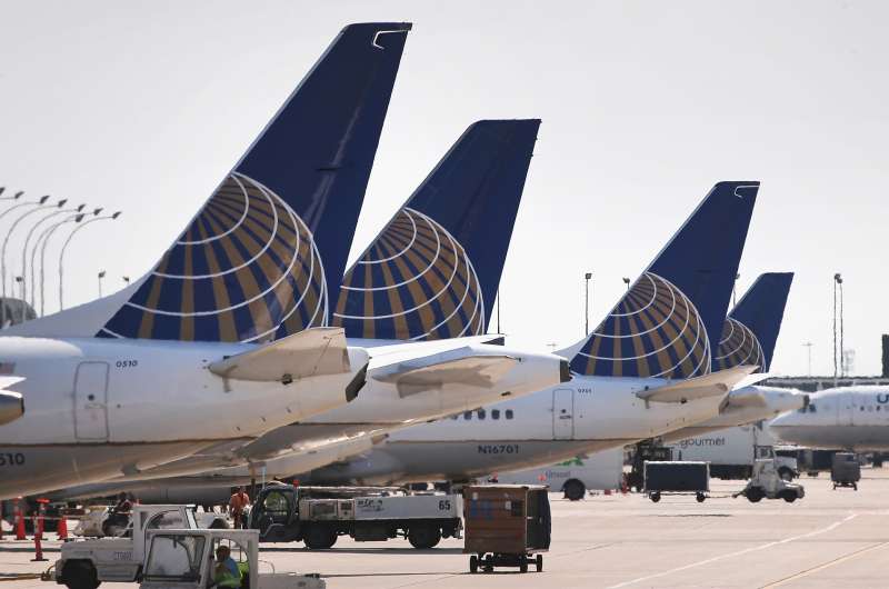 United Airlines jets sit at gates at O'Hare International Airport on September 19, 2014 in Chicago, Illinois.