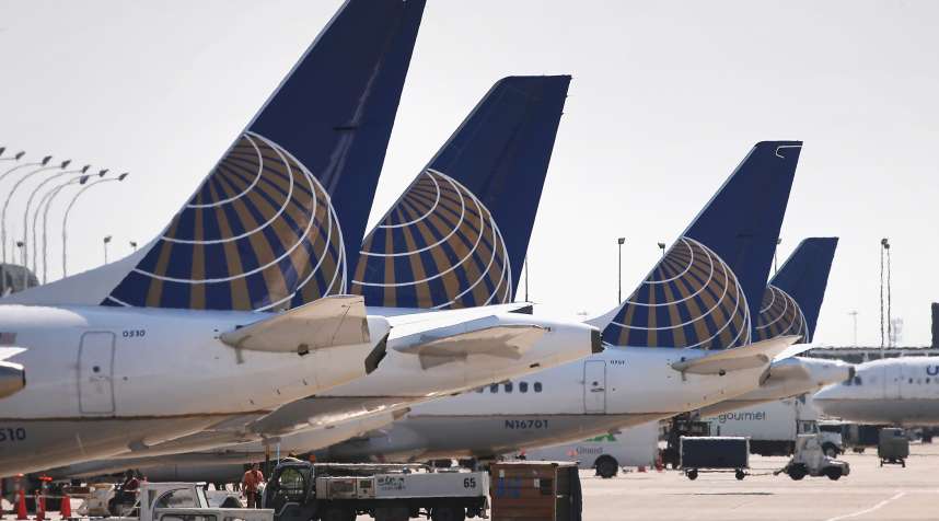 United Airlines jets sit at gates at O'Hare International Airport on September 19, 2014 in Chicago, Illinois.