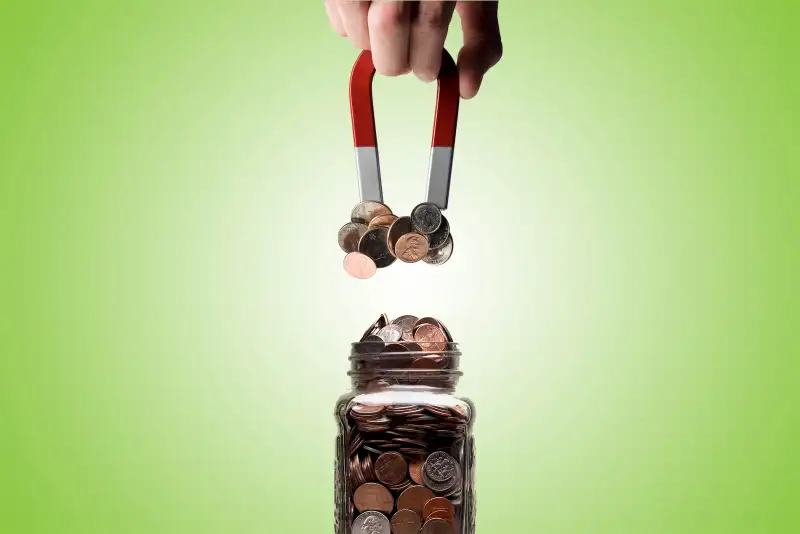 MAGNET pulling money out of jar