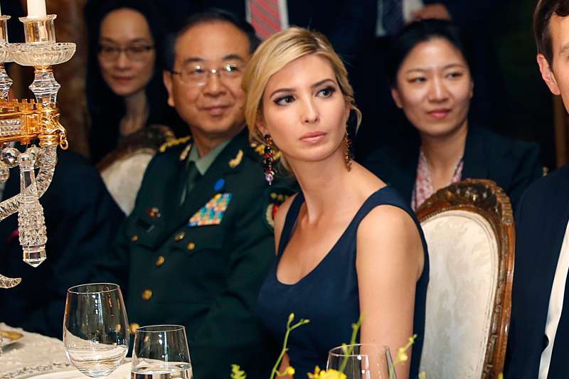 In this Thursday, April 6, 2017, file photo, Ivanka Trump, second from right, the daughter and assistant to President Donald Trump, is seated with her husband, White House senior adviser Jared Kushner, right, during a dinner with President Donald Trump and Chinese President Xi Jinping at Mar-a-Lago in Palm Beach, Fla. Earlier in the day, Ivanka Trump's company received provisional approval from the Chinese government for three new trademarks, winning monopoly rights to sell Ivanka brand jewelry, bags and spa services in the world's second-largest economy.
