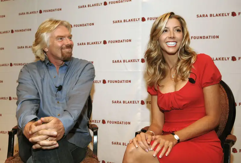 Sir Richard Branson and Sara Blakely during Sir Richard Branson Co-Hosts the Sara Blakely Foundation Give a Damn Party - Press Conference at Ritz Carlton - Atlanta in Atlanta, Georgia.