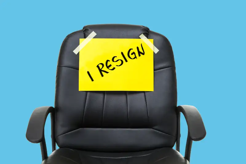 office chair with i resign sign on it