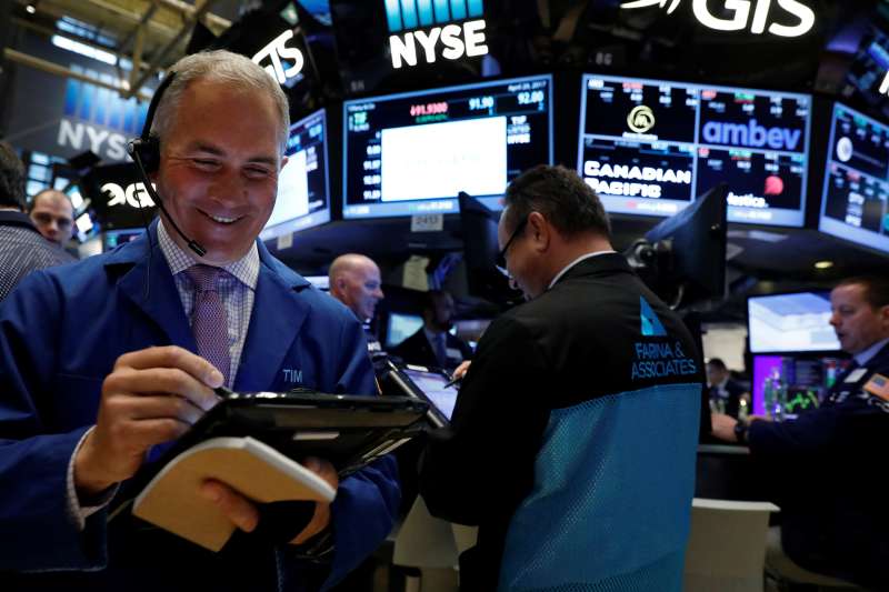 Traders work on the floor of the New York Stock Exchange (NYSE) in New York, U.S., April 20, 2017.