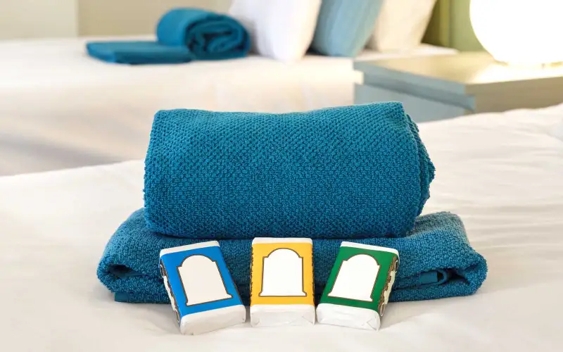 Bed with Towels and Soap