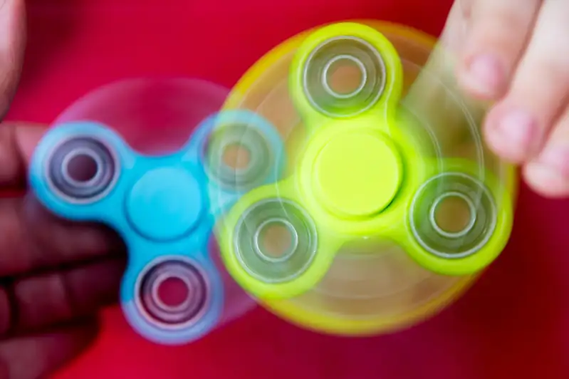 Sunday  30 April 2014 Pictured: A young boy uses a fidget spinner