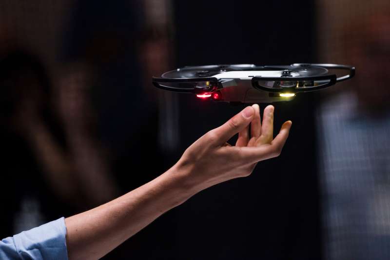 Michael Perry, director of strategic partnerships at SZ DJI Technology Co., pilots the Spark gesture controlled drone during the company's launch event in New York, U.S., on Wednesday, May 24, 2017. DJI unveiled a small camera drone starting at $499 that can take off and land from the palm of a hand, seeking to appeal to the broader consumer market.