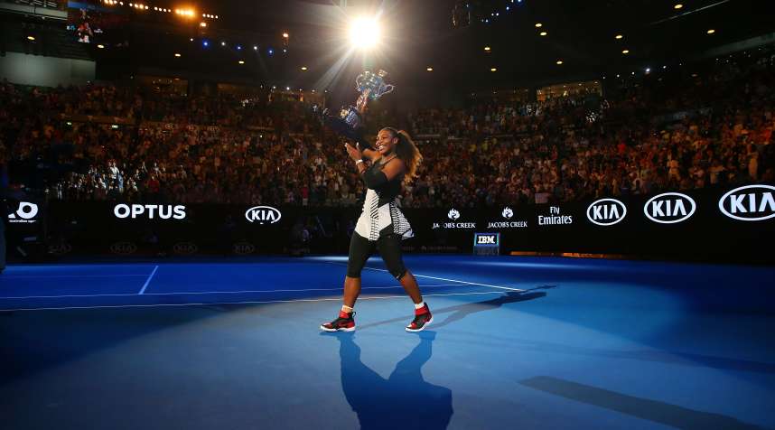 Serena Williams waves to the crowd as she leaves the court with the Daphne Akhurst Trophy after winning the Women's Singles Final against Venus Williams of the United States on day 13 of the 2017 Australian Open at Melbourne Park on January 28, 2017 in Melbourne, Australia.