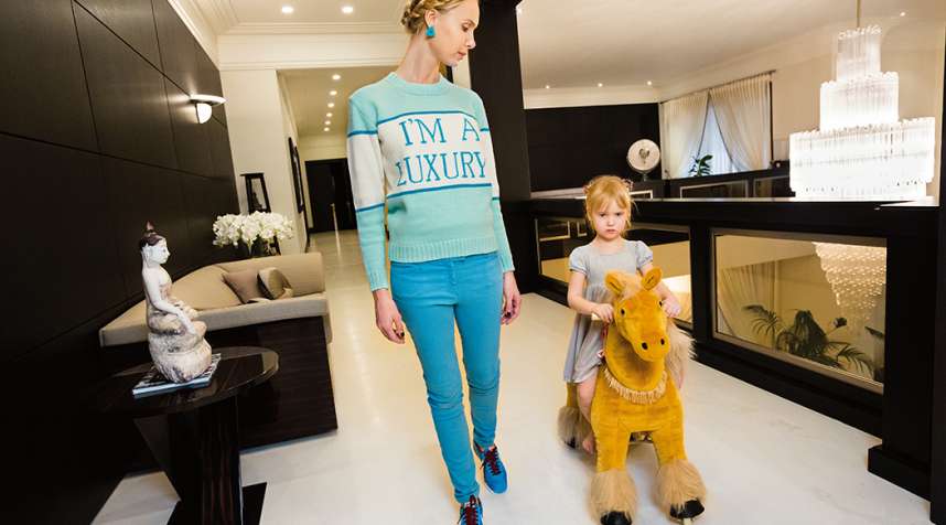 Russian socialite Ilona Stolie and her daughter Michelle, 4, in their Frank Lloyd Wright-inspired mansion, located in Rublyovka, an elite residential area outside of Moscow.