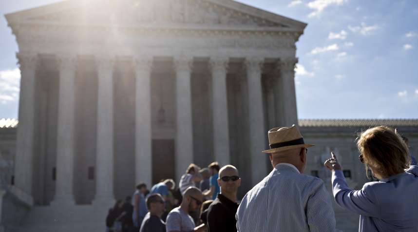 Visitors wait to enter the U.S. Supreme Court in Washington, D.C., U.S., on Monday, June 26, 2017. The U.S. Supreme Court is letting the Trump Administration enforce  its 90-day ban on travelers from six mostly Muslim countries.