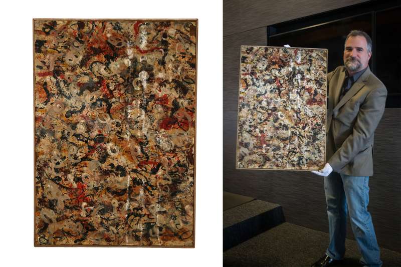 Auctioneer Josh Levine holds a Jackson Pollock gouache painting that will be auctioned in Scottsdale, Ariz. on June 20