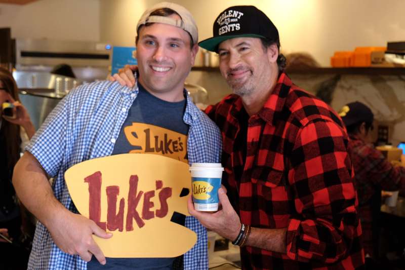 Actor Scott Patterson poses with a fan at a  Gilmore Girls  themed pop-up of Luke's Diner on October 5, 2016 in Beverly Hills, California.