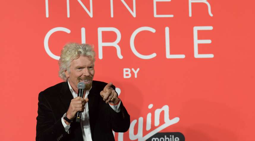 Virgin Group Founder Sir Richard Branson announces Virgin Mobile's new offer at an event in San Francisco.