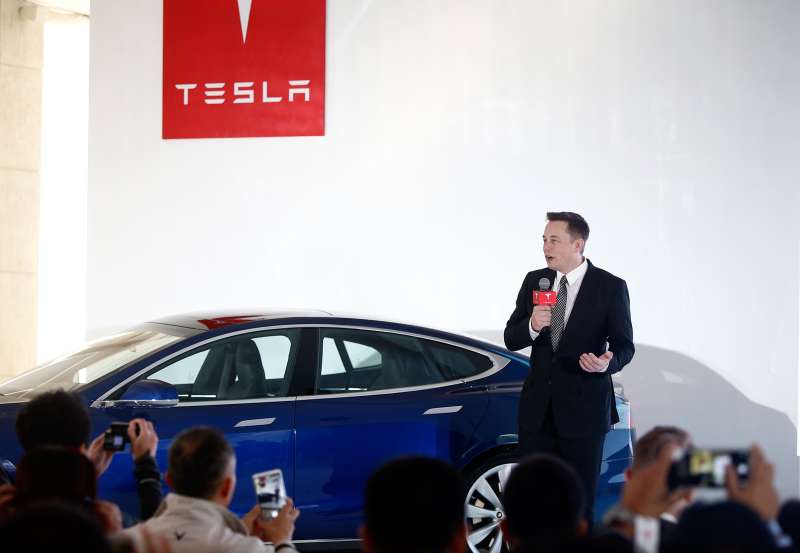 Elon Musk, Chairman, CEO and Product Architect of Tesla Motors, addresses a press conference to declare that the Tesla Motors releases v7.0 System in China on a limited basis for its Model S, on October 23, 2015 in Beijing, China.