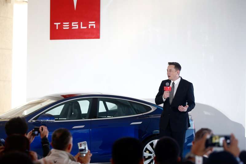 Elon Musk, Chairman, CEO and Product Architect of Tesla Motors, addresses a press conference to declare that the Tesla Motors releases v7.0 System in China on a limited basis for its Model S, on October 23, 2015 in Beijing, China.