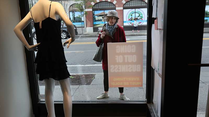 Customers see the business closing signs outside of the Second Time Around consignment shop in Brookline, MA on Jun. 5, 2017. The consignment shops Second Time Around are closing and many customers have not been paid.